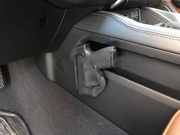 Anyone else annoyed by the side pockets on the center console? Ideas for  them?